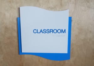 Classroom sign with the Braille translation