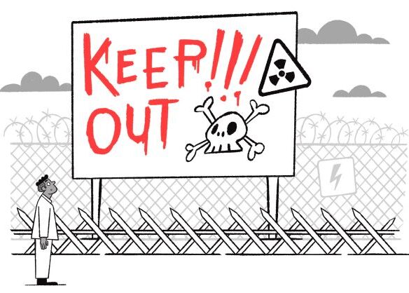 Person looking at a warning sign